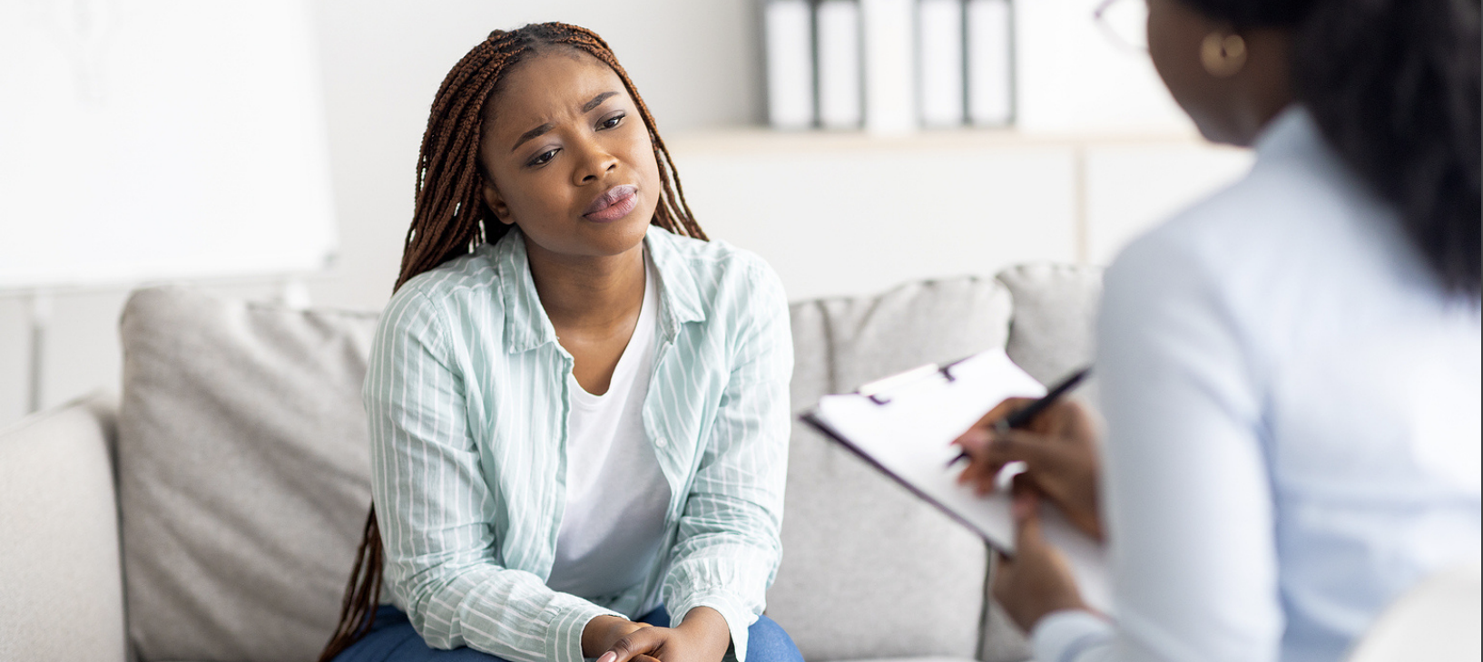 Woman speaking with therapist