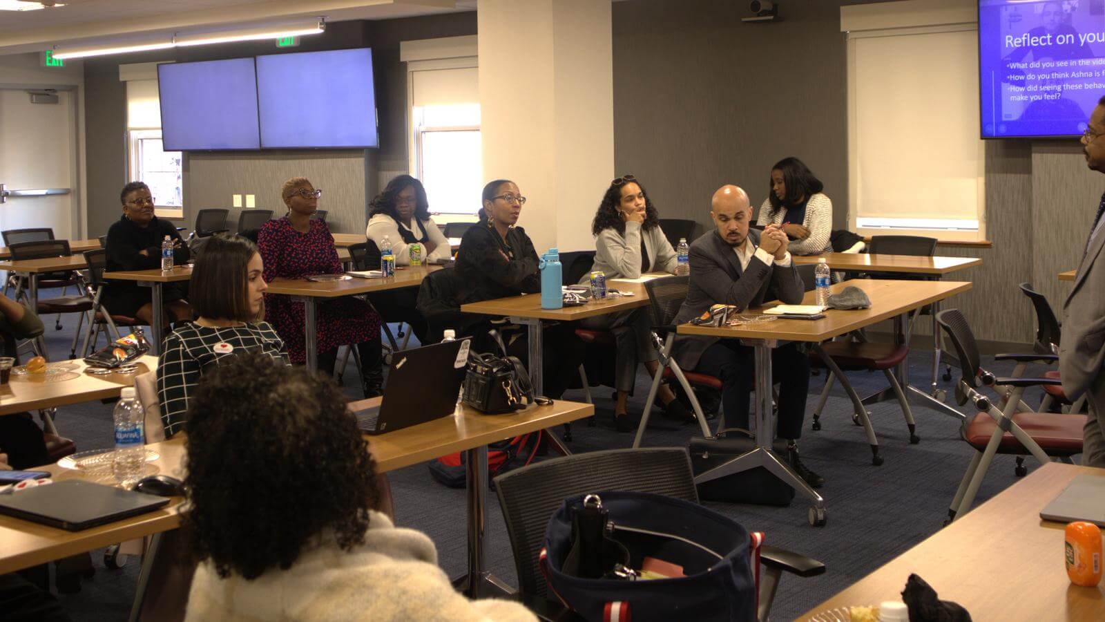charles talking with senior leaders 