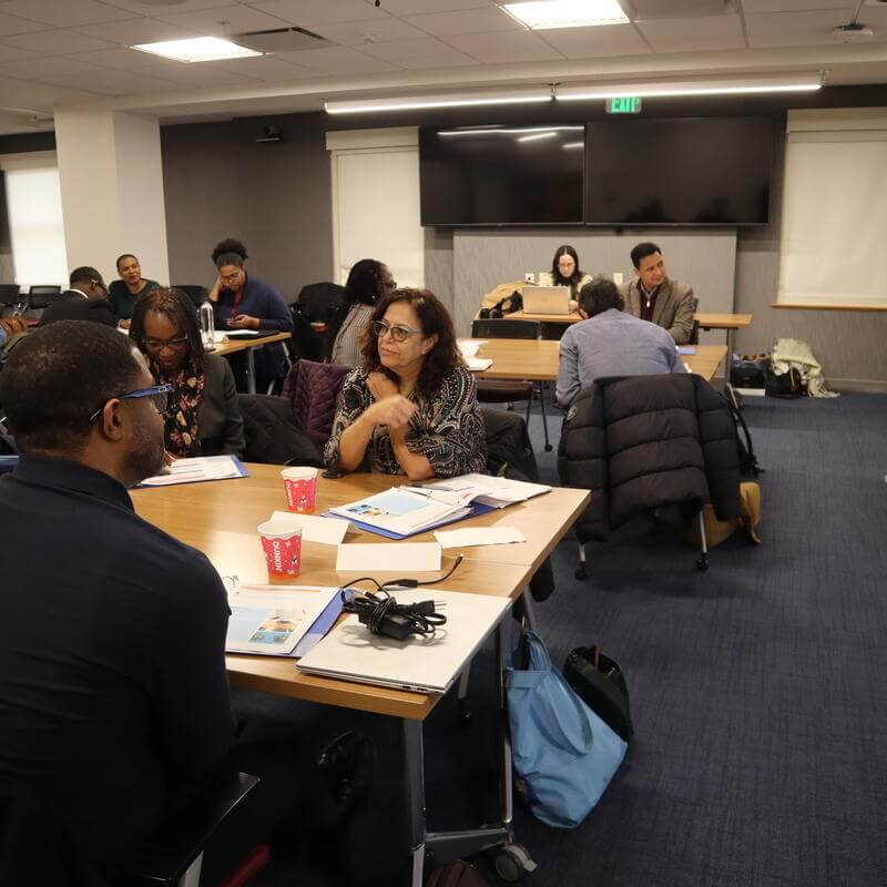 Leaders listening in group discussion